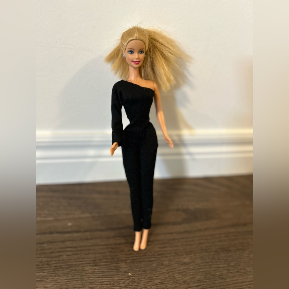 Barbie 1991 Mattel doll with Black One-Shoulder Jumpsuit dress.
